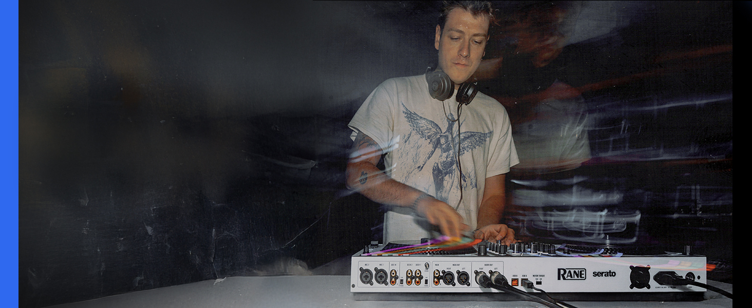 Musical keyboard or synthesizer equipment being used, showing black and white keys and electronic display panel.