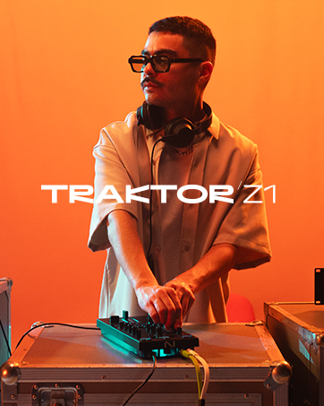 Text reads 'TRAKTOR Z1'. Man wearing sunglasses and orange/yellow shirt operating turntables against bright orange background. Professional DJ equipment setup displayed.