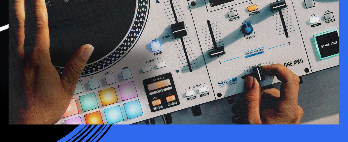 Close-up of DJ equipment setup showing turntables and mixer with illuminated buttons and controls against blue lighting.