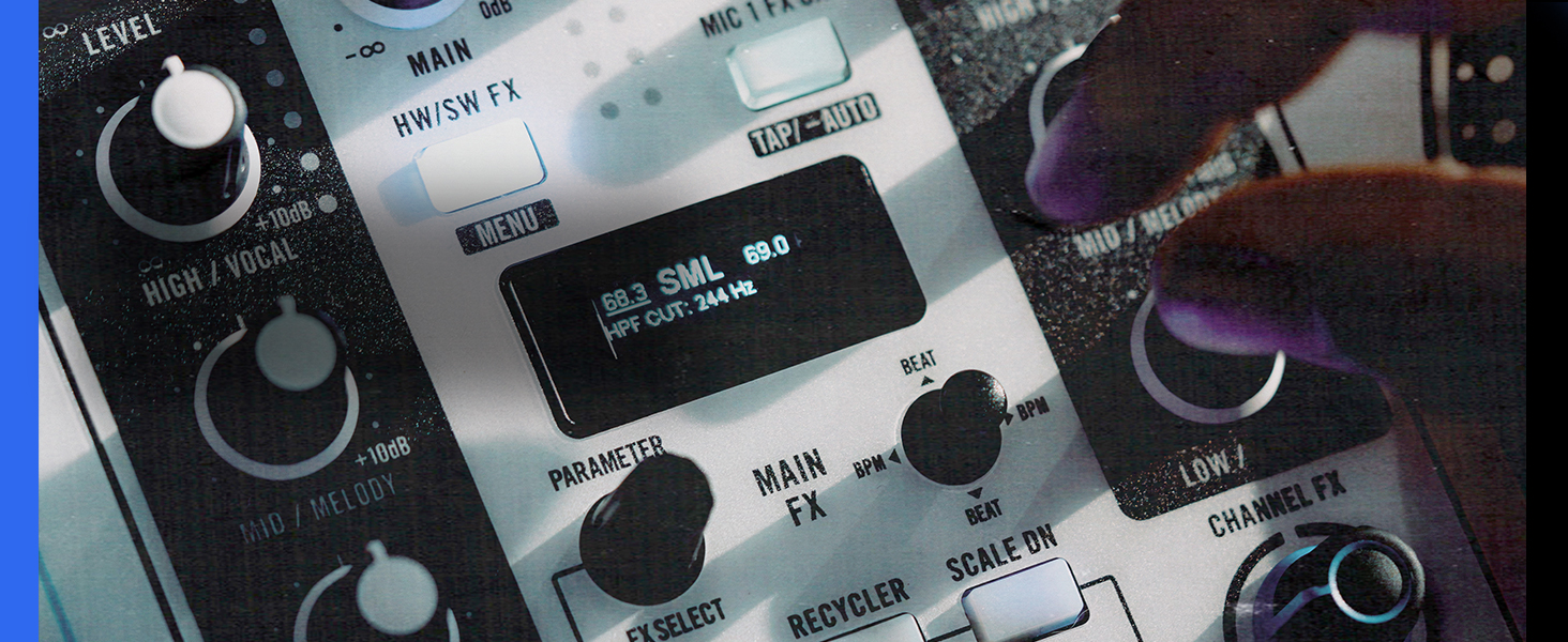 Close-up of audio equipment control panel showing multiple knobs, dials, and switches against dark background.