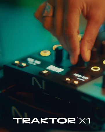 Text reads: 'TRAKTOR X1'. DJ turntable with hands manipulating controls, illuminated gold buttons and knobs on black control surface against teal and orange gradient background.