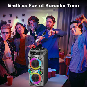 Portable karaoke speaker system with illuminated dual speakers, shown in use during indoor party setting.