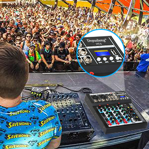 a man in a blue shirt is playing music on a stage.